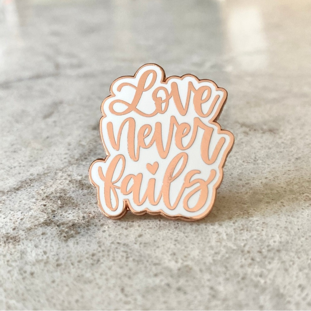 Love Never Fails Enamel Pin - White and Rose Gold